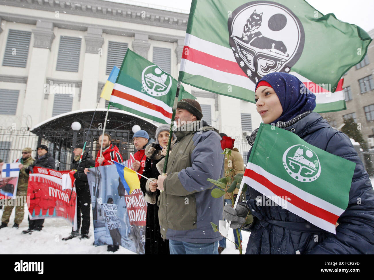 Kiev, Ukraine. 23rd Jan, 2016. Activists from Ukrainian voluntary battalions 'Georgia national legion', Chechen battalion named of Dzhokhar Dudayev, and their supporters during protest against the politics of Russian President Vladimir Putin, in front the Russian Embassy. © Vasyl Shevchenko/Pacific Press/Alamy Live News Stock Photo