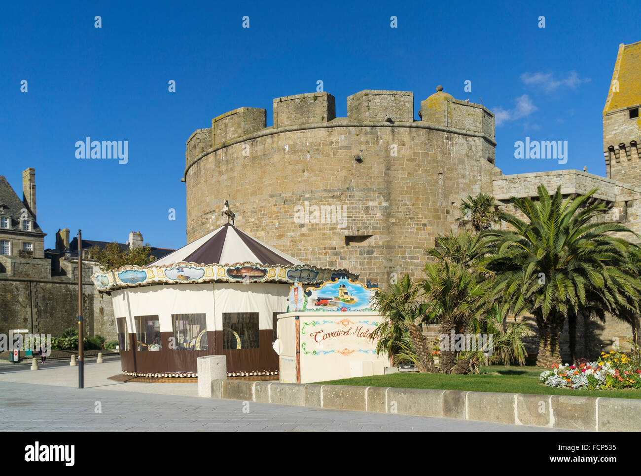 City walls and carousel at St Malo, Brittany, France Stock Photo