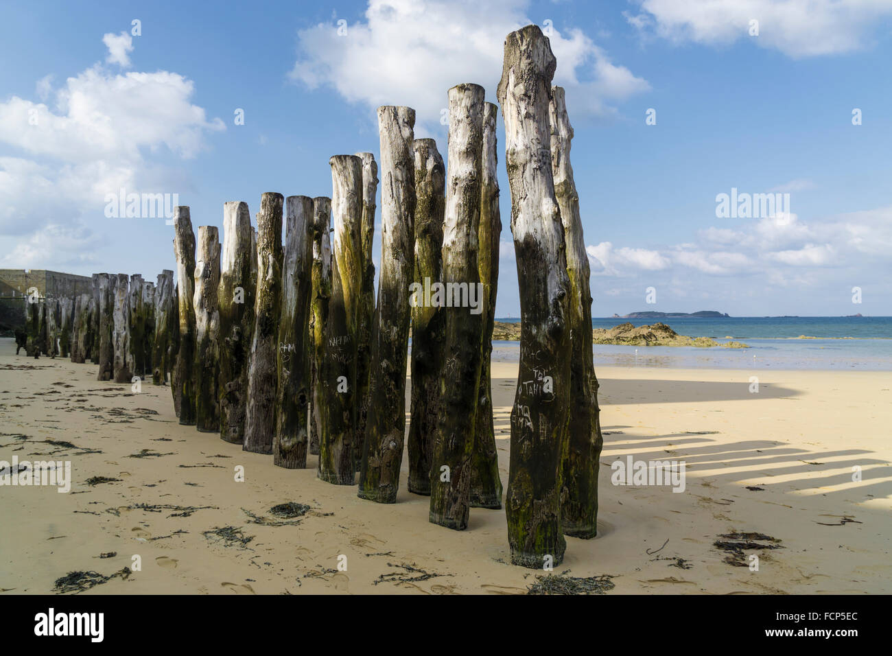 Groynes on the beach at St Malo, Brittany, France Stock Photo