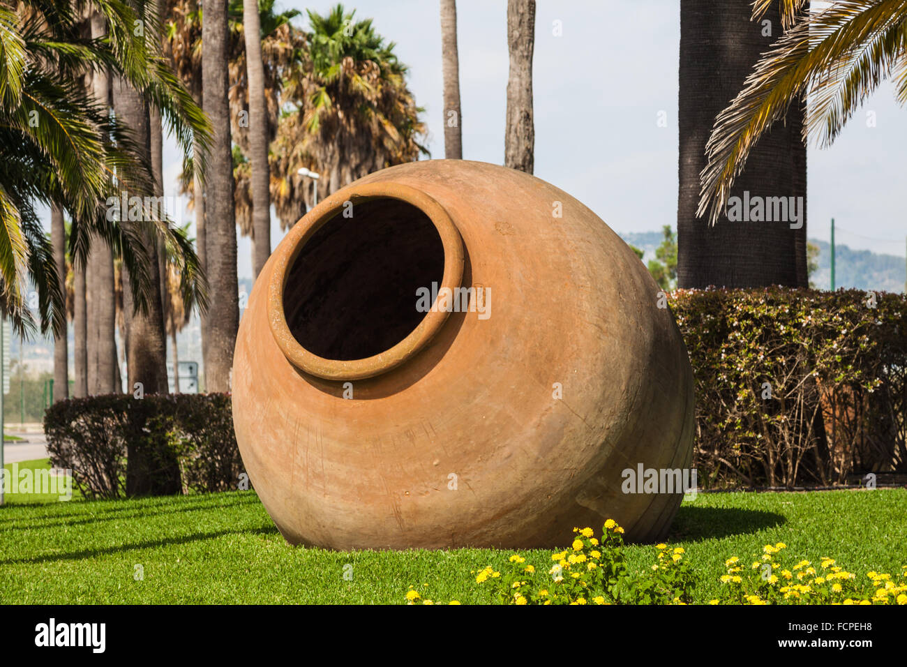 Old Pottery Crock As Decoration Is On The Ground Stock Photo