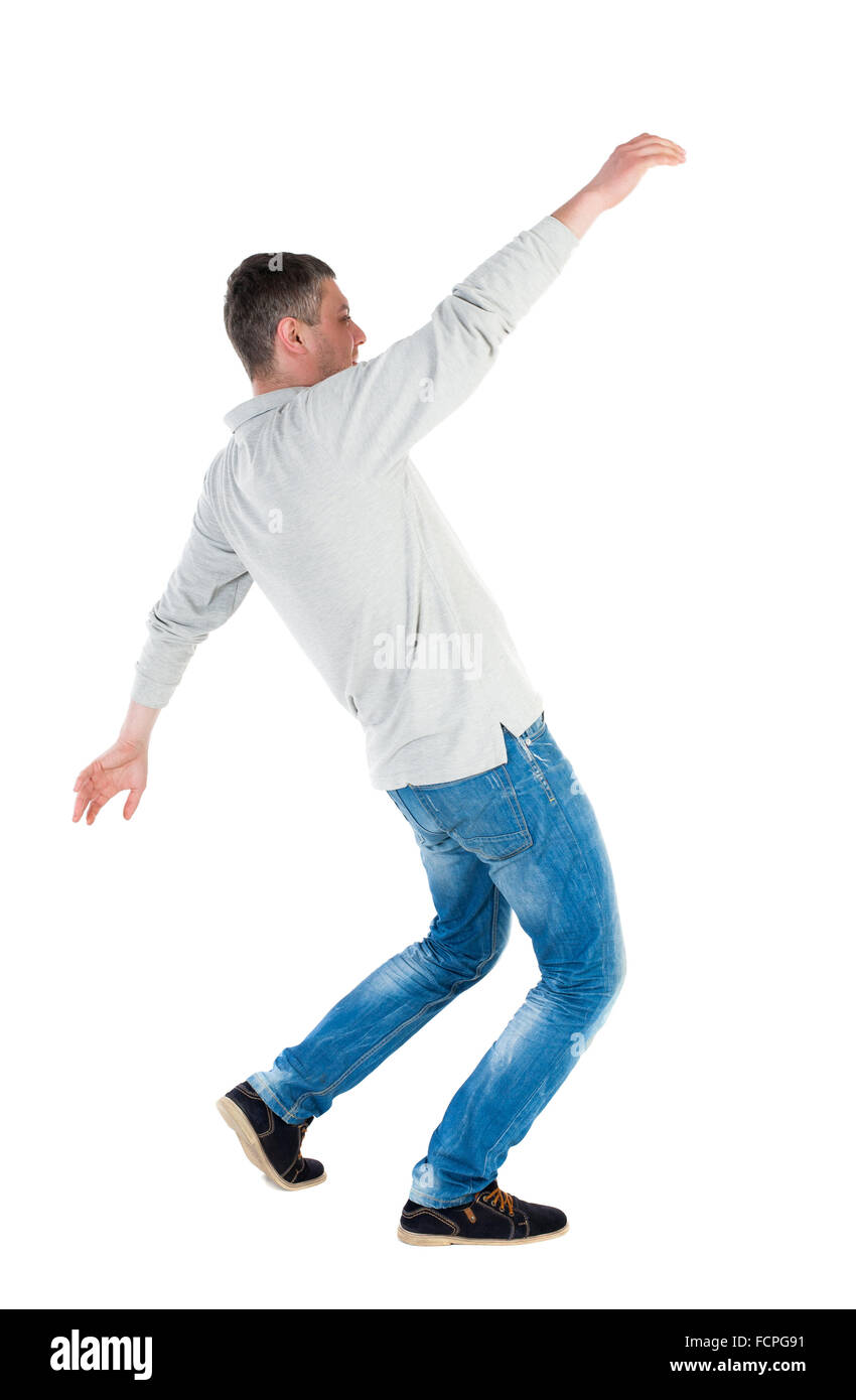 Back view man Balances waving his arms. Rear view people collection