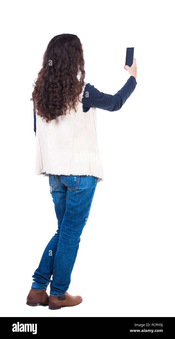 Young woman long curly hair rear view Cut Out Stock Images & Pictures -  Alamy