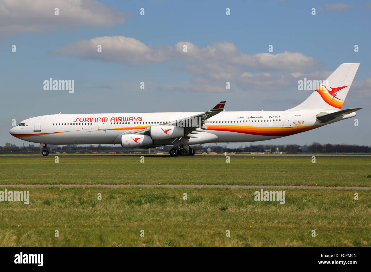Amsterdam, Netherlands - April 19, 2015: A Surinam Airways Airbus A340 with the registration PZ-TCP taking off at Amsterdam Schi Stock Photo