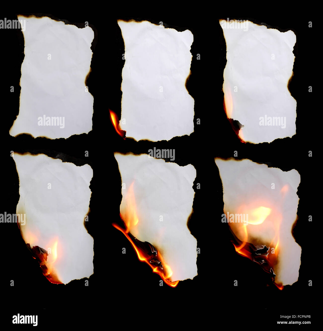 burning paper in dark background Stock Photo