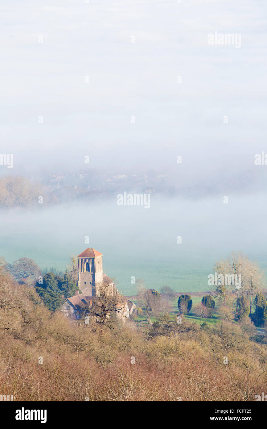 Little Malvern Priory, Malvern on a misty winters day from the Malvern Hills, Worcestershire, England, UK Stock Photo