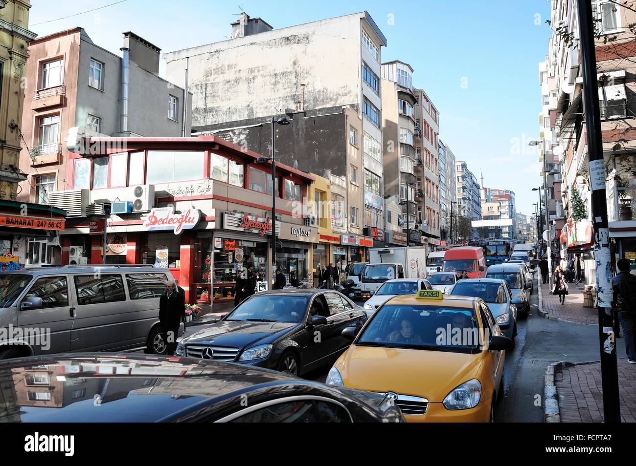 Istanbul, street scene with yellow taxi in traffic Stock Photo