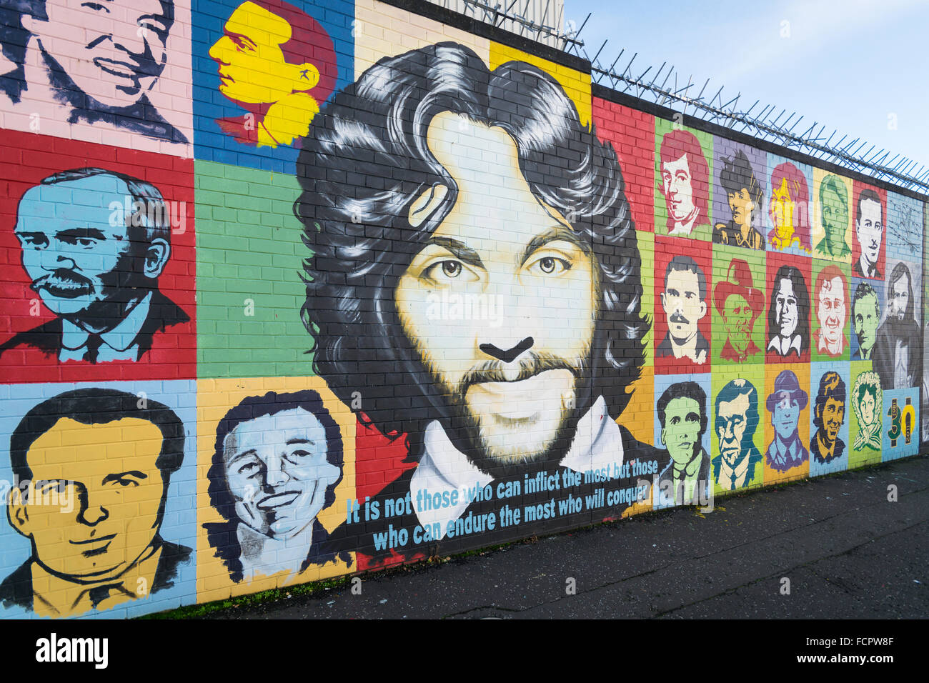 Irish republican mural at International Wall in the Falls Road area of Belfast depicting Irish revolutionary figures. Stock Photo