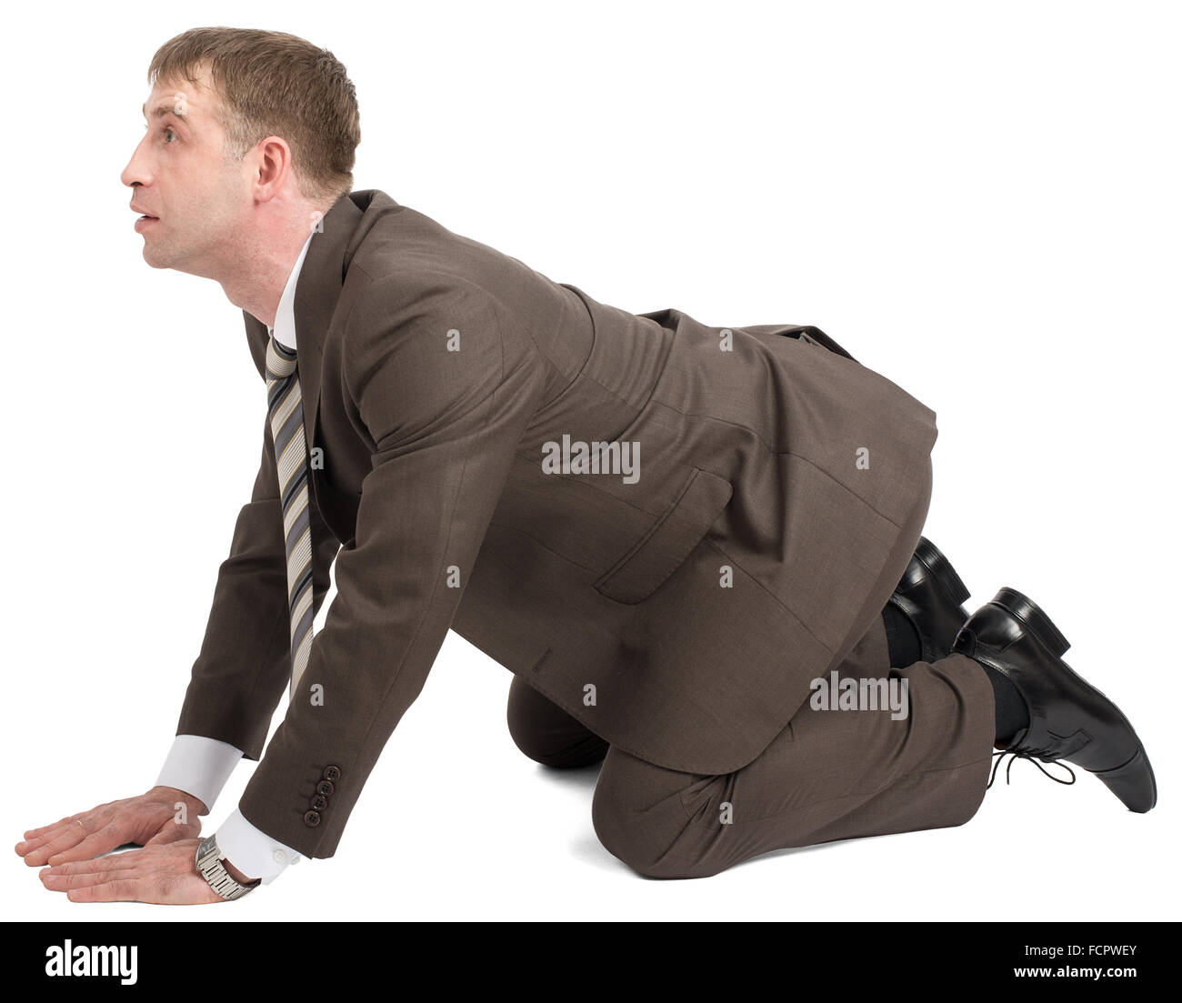 Businessman on knees hi-res stock photography and images - Alamy