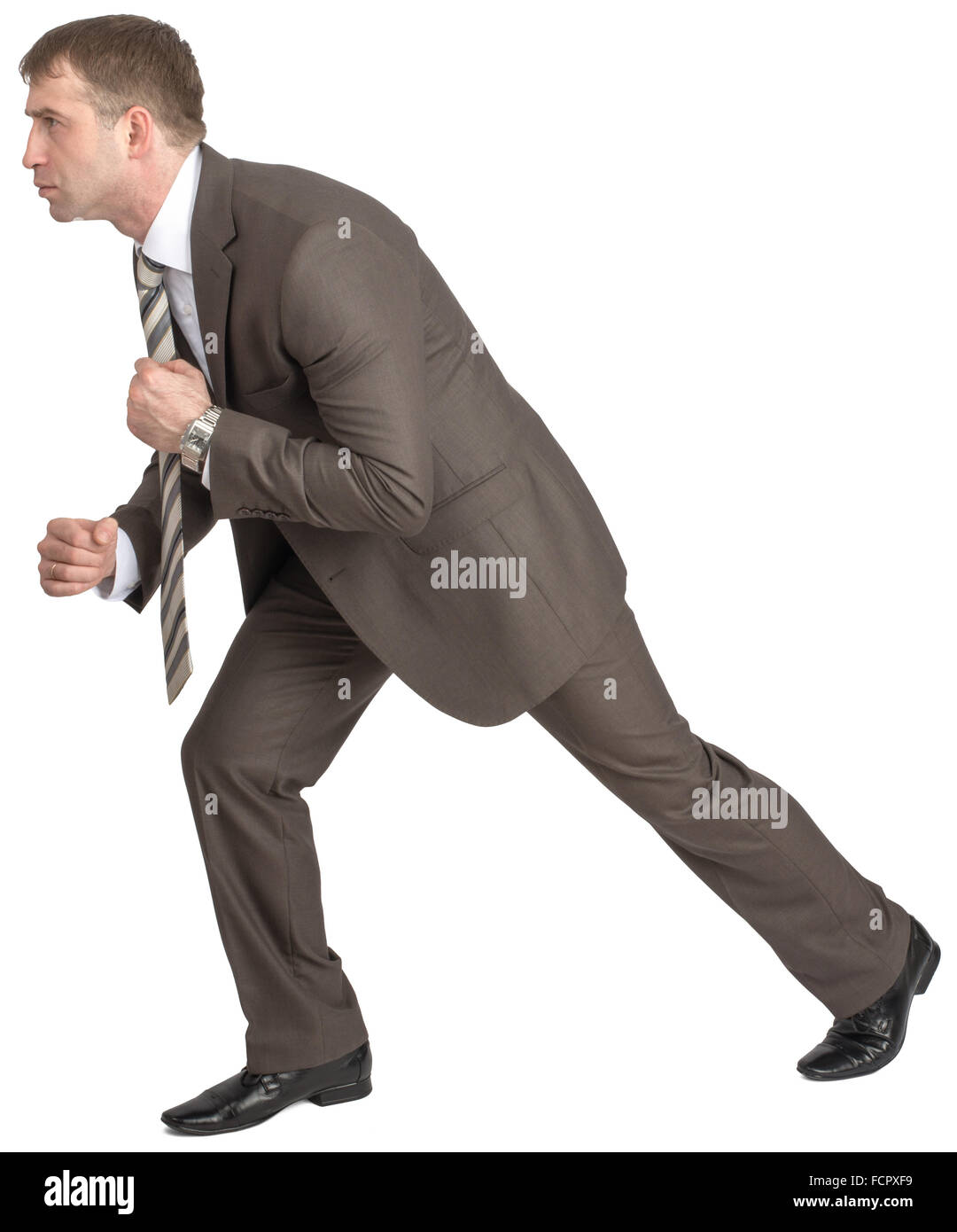 Businessman pulling invisible rope Stock Photo - Alamy