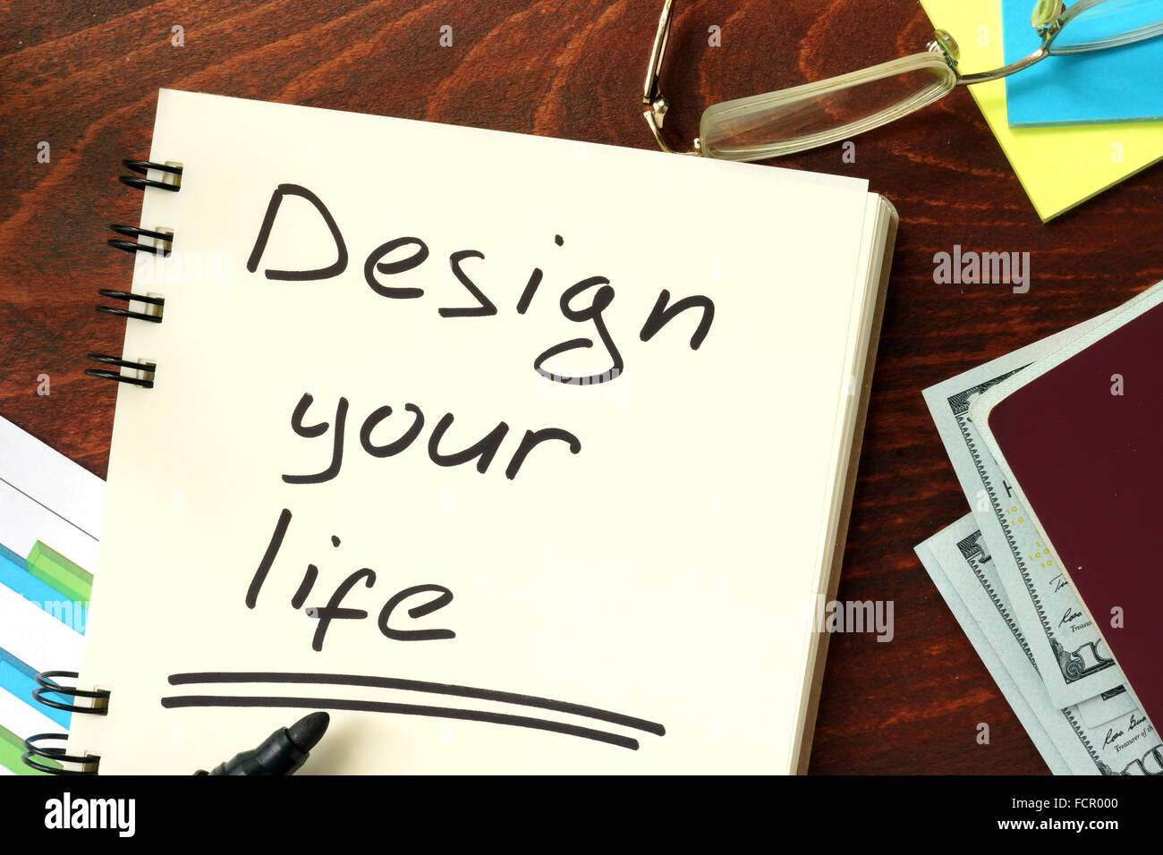 Words Design your life written in the notepad. Stock Photo