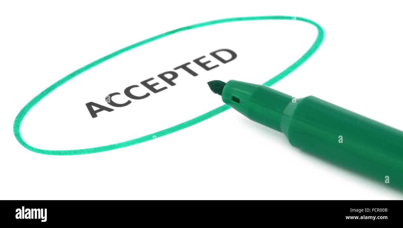 ACCEPTED written in a white paper with green signature pen Stock Photo