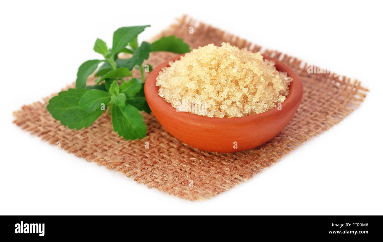 Coarse crystals of brown sugar with stevia leaves Stock Photo Alamy