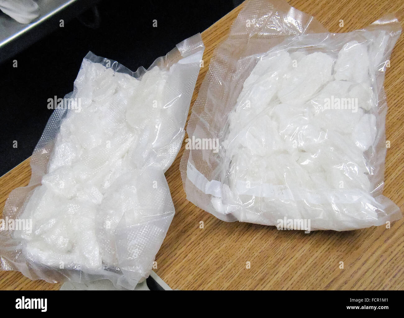 Vacumn packed bags of crystal meths (methanphimeine) intercepted by U.S. Customs and Border Protection at the San Luis port of entry in Arizona, US-Mexico border on 18 August 2013. Stock Photo
