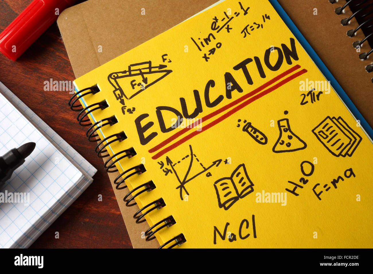 Notebook with  education sign. Stock Photo
