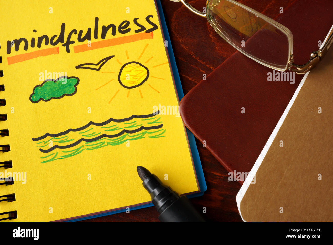 Notebook with mindfulness  sign. Stock Photo