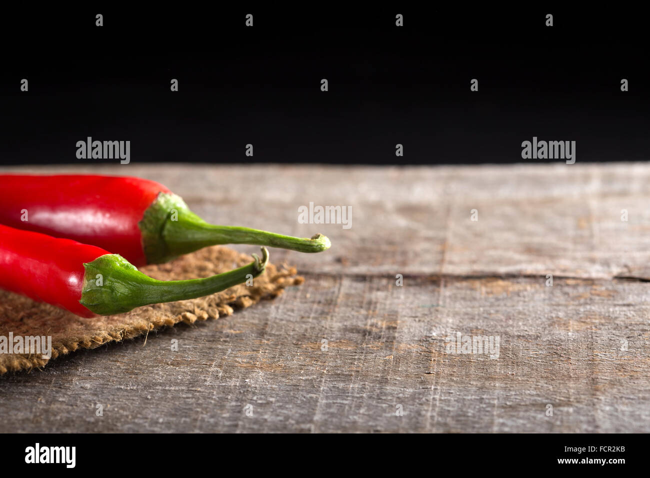 Red chili peppers on a sackcloth Stock Photo