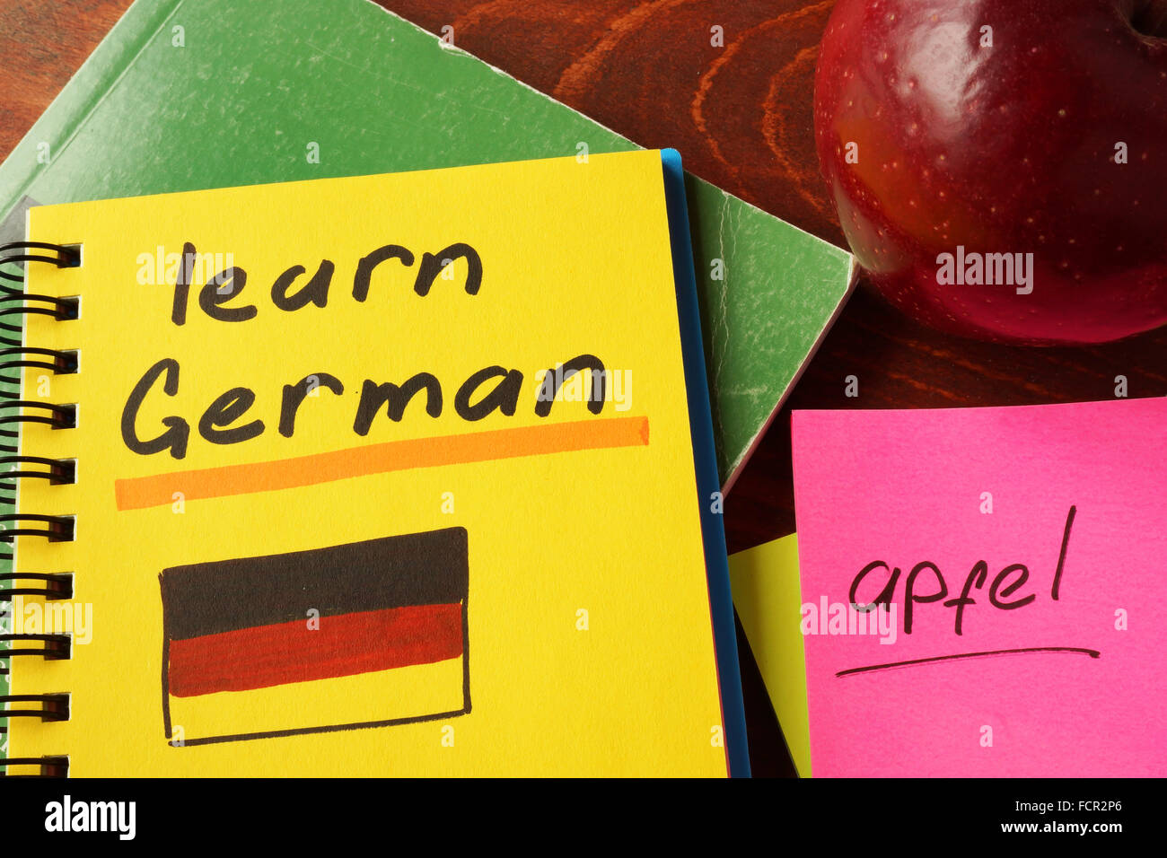 Notebook with  learn German sign. Education concept. Stock Photo