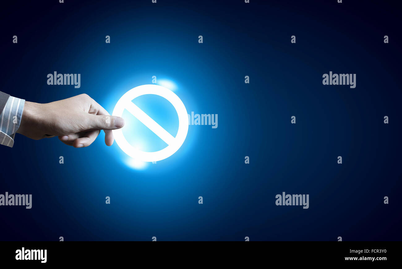 Close up of hand with stop media icon Stock Photo - Alamy