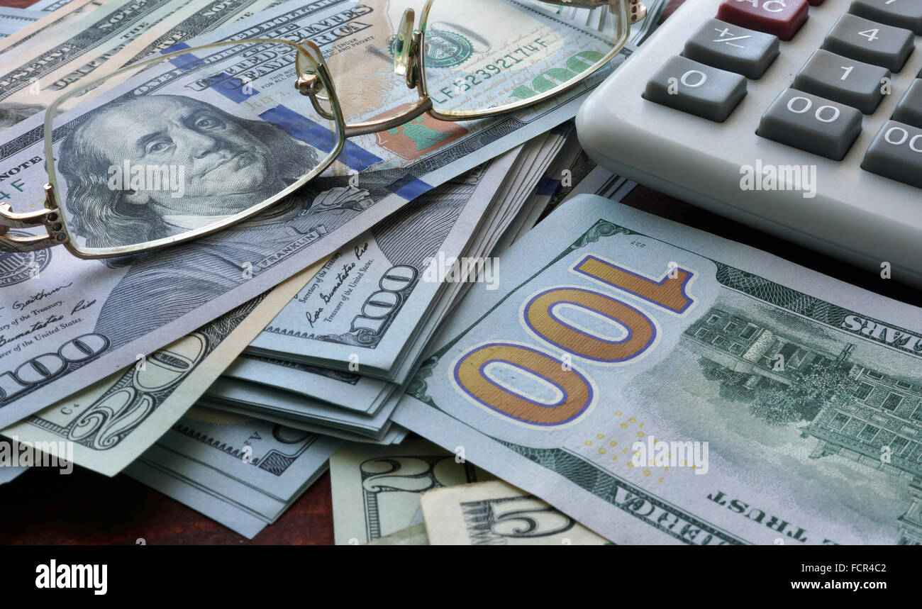 Finance background with money and calculator. Stock Photo