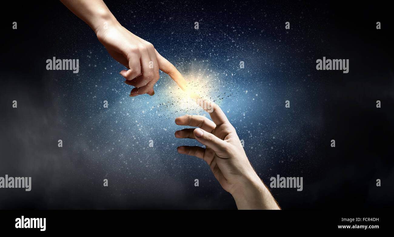 Close up of human hands reaching each other with fingers Stock Photo ...