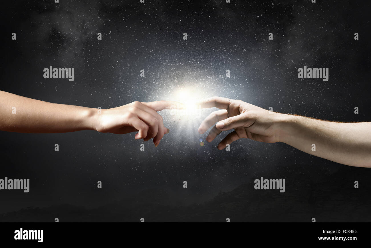 Close up of human hands reaching each other with fingers Stock Photo ...