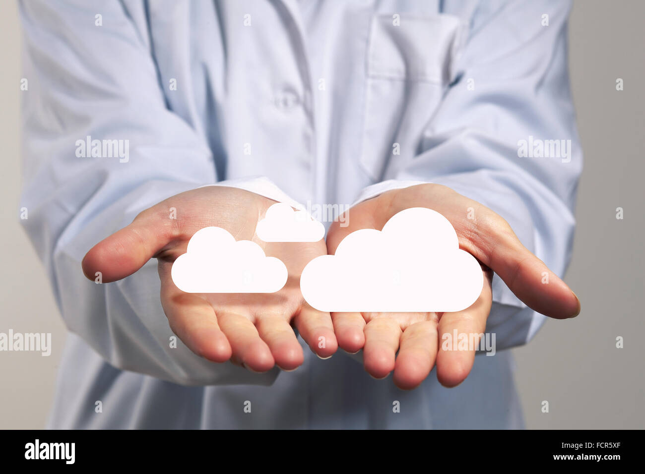 Icon of cloud computing concept in human hands Stock Photo - Alamy