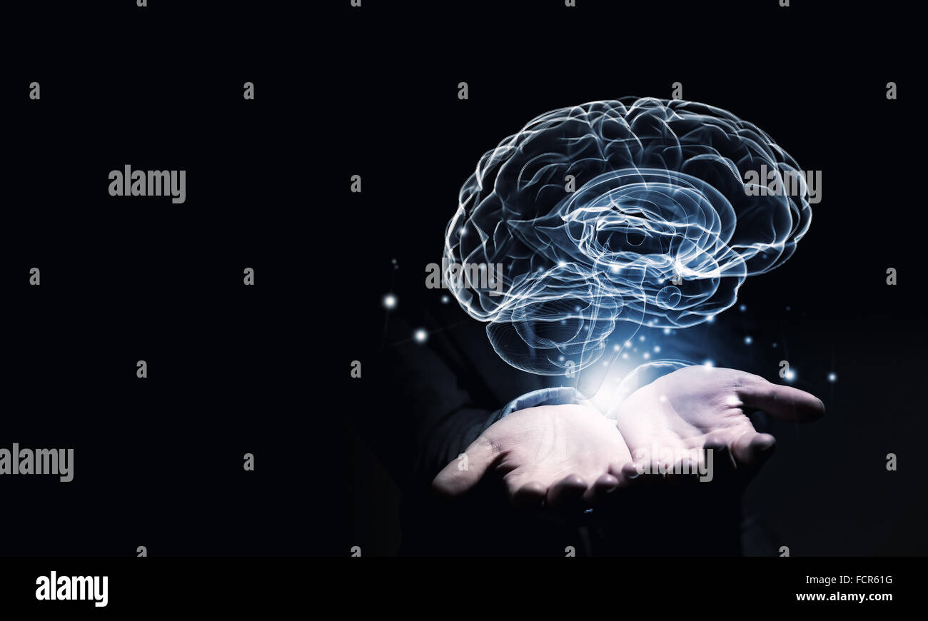 Close up of businessman holding digital image of brain in palm Stock ...