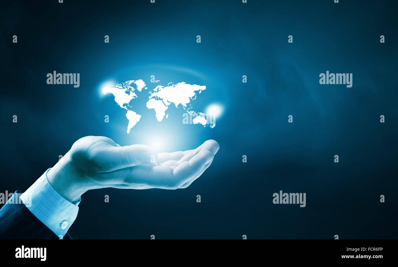 Close up of male hand holding map icon Stock Photo - Alamy