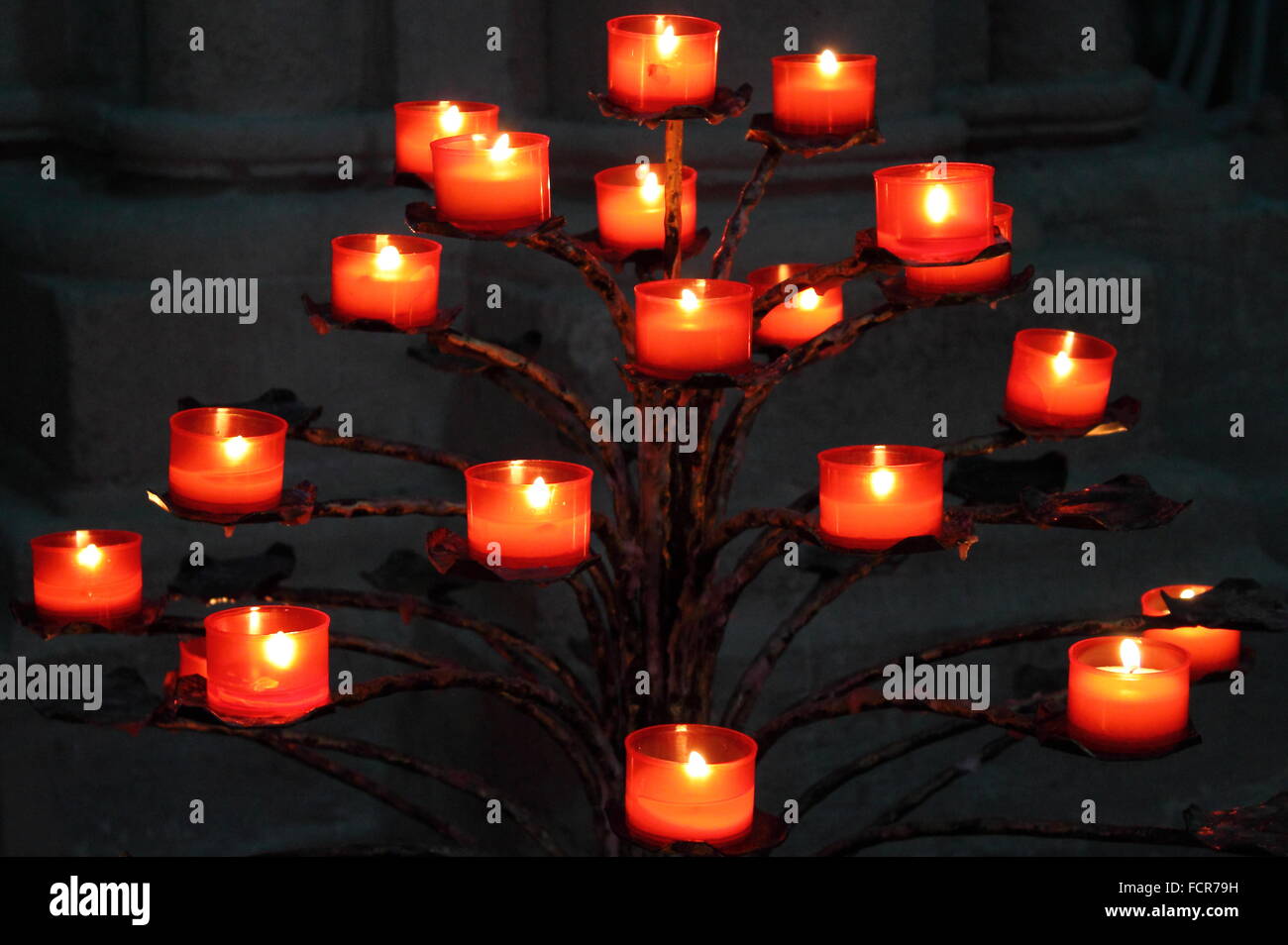 Burning candles in a church Stock Photo Alamy