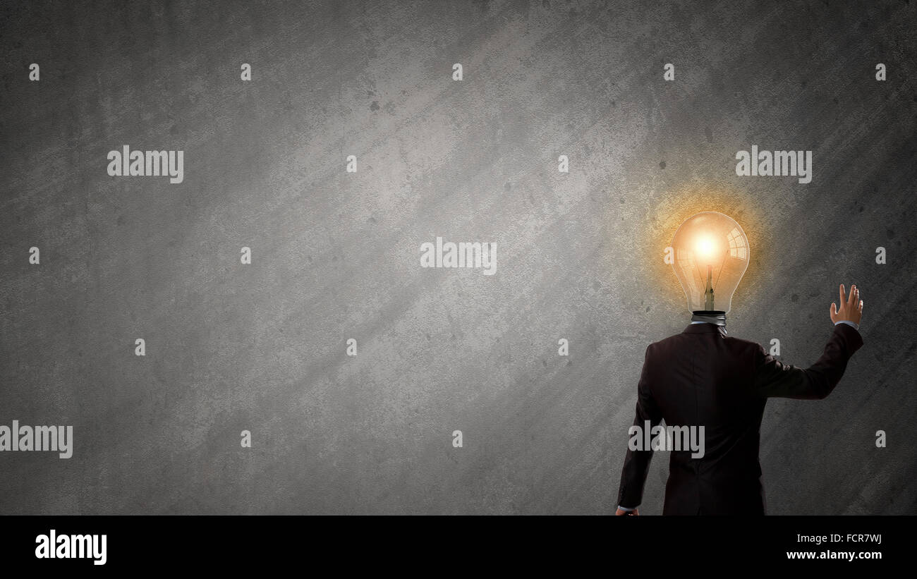 Idea concept with businessman and light bulb instead of his head Stock ...