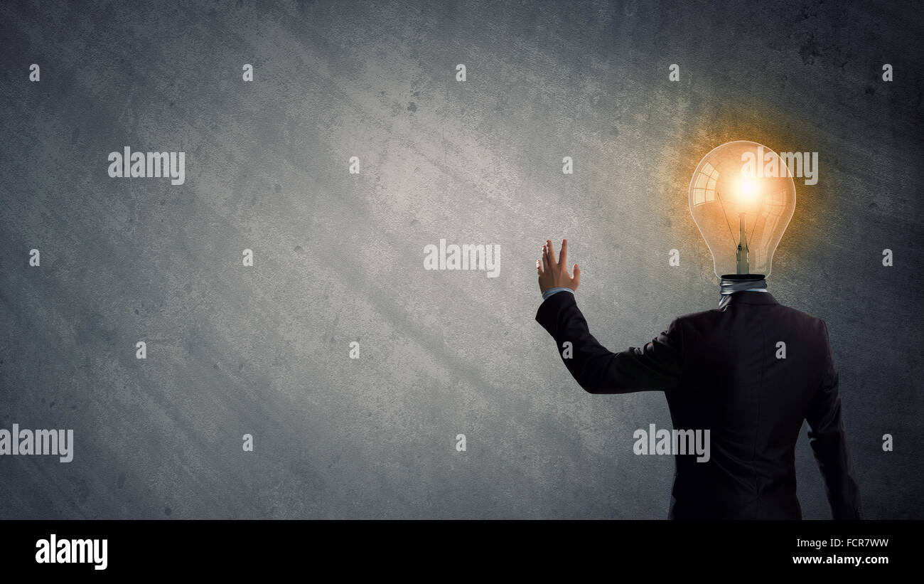 Idea concept with businessman and light bulb instead of his head Stock ...