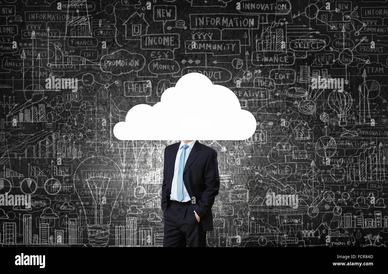 Businessman standing with his head in cloud Stock Photo - Alamy