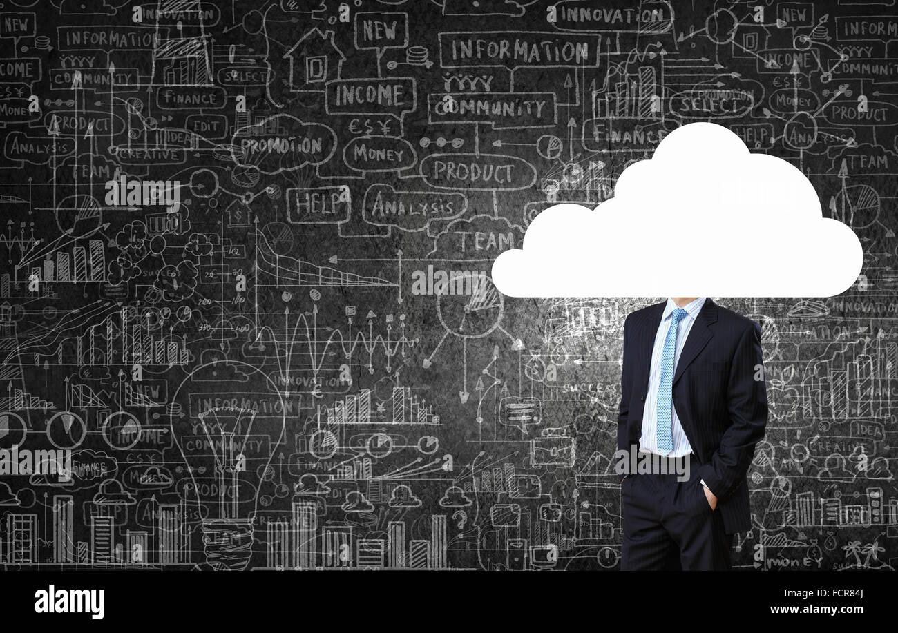 Businessman standing with his head in cloud Stock Photo - Alamy