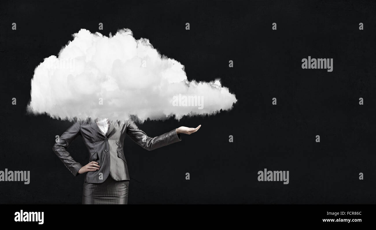 Businesswoman standing with cloud instead of head Stock Photo - Alamy