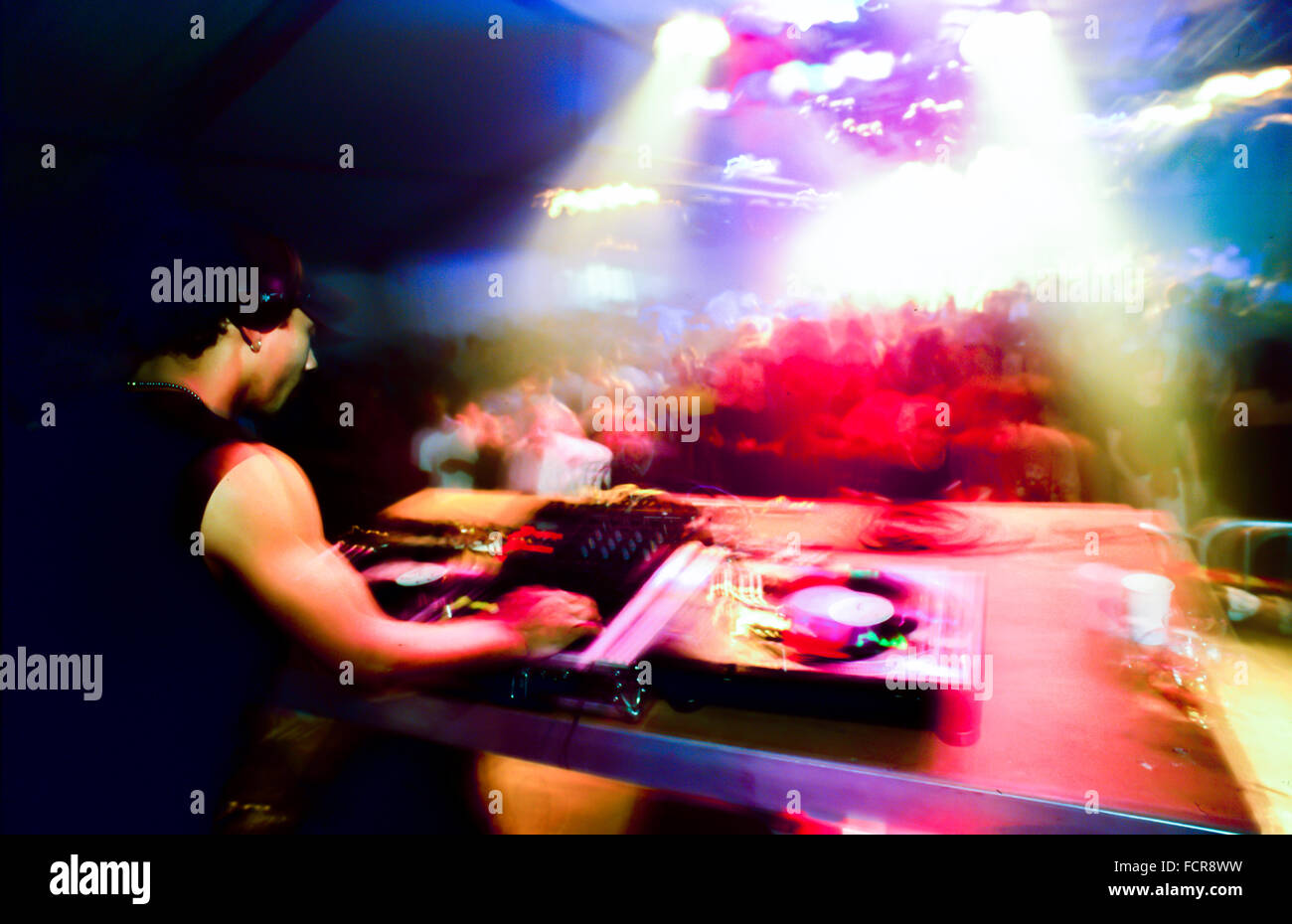 Paris, France, French Young D.J. Spinning Techno Music in Crowded