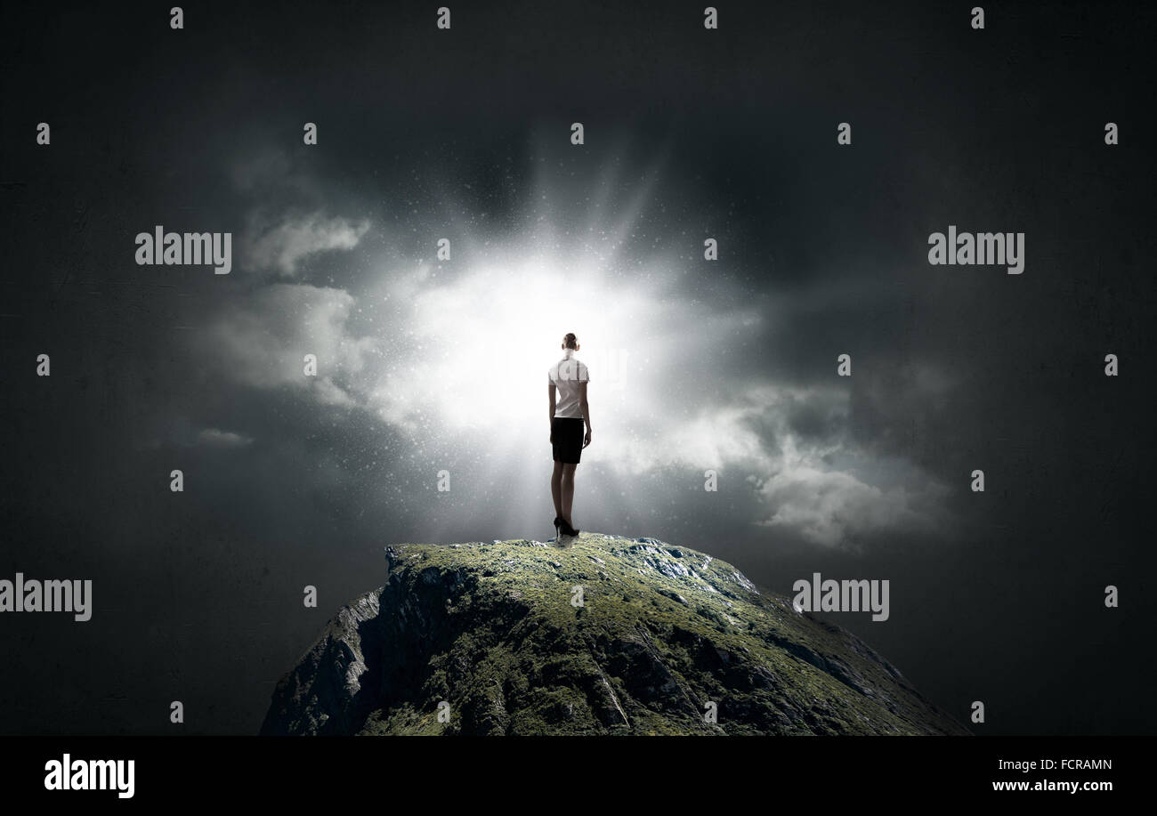 Businesswoman standing mountain top hi-res stock photography and images ...
