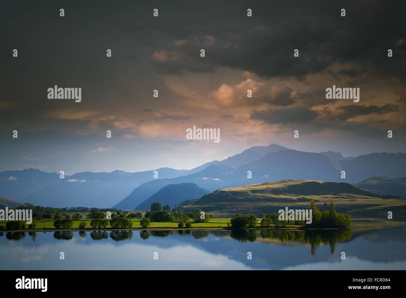 Beautiful natural landscape of mountain lake and field Stock Photo - Alamy