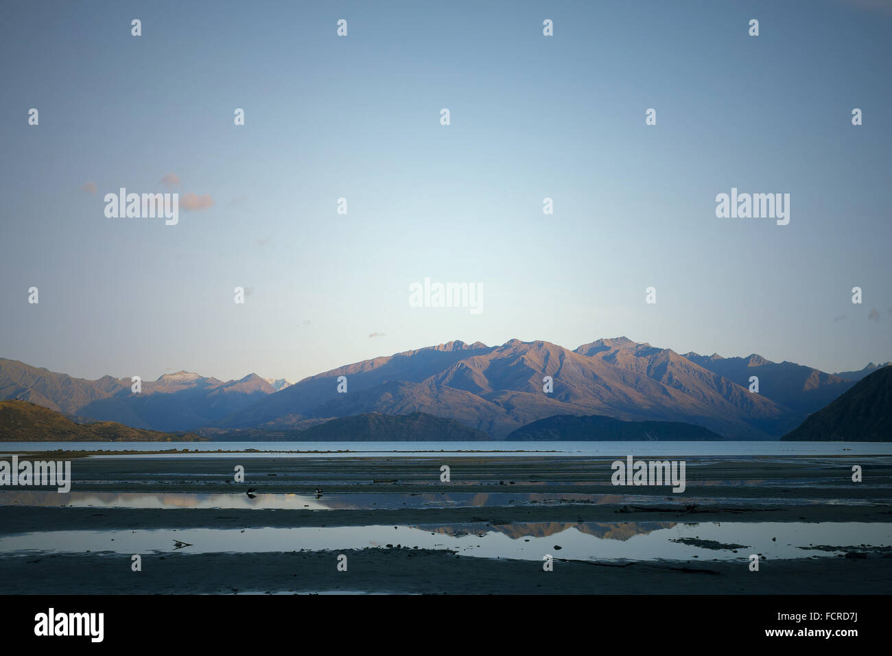 Beautiful natural landscape of mountain lake and field Stock Photo - Alamy