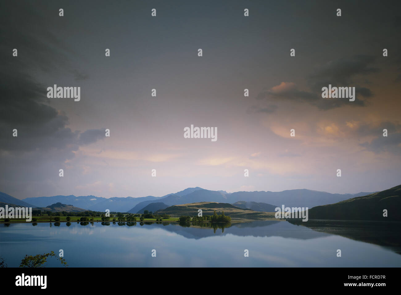 Beautiful natural landscape of mountain lake and field Stock Photo - Alamy