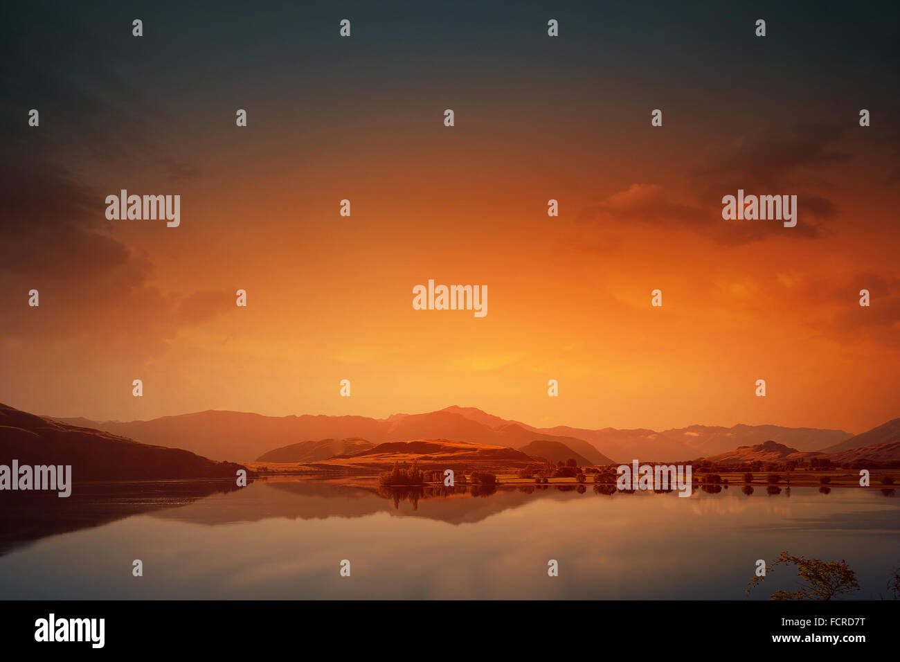 Beautiful natural landscape of mountain lake and field Stock Photo - Alamy