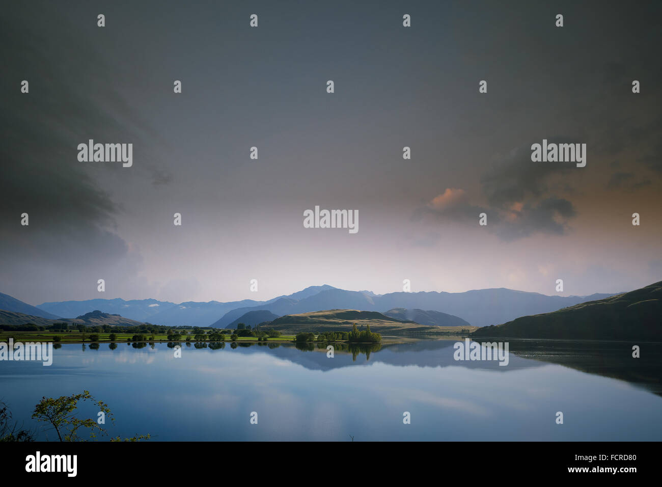 Beautiful natural landscape of mountain lake and field Stock Photo - Alamy