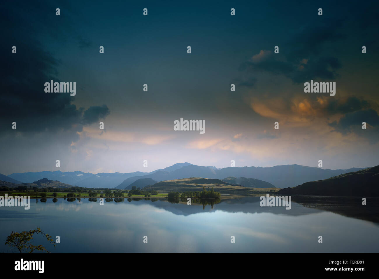 Beautiful natural landscape of mountain lake and field Stock Photo - Alamy