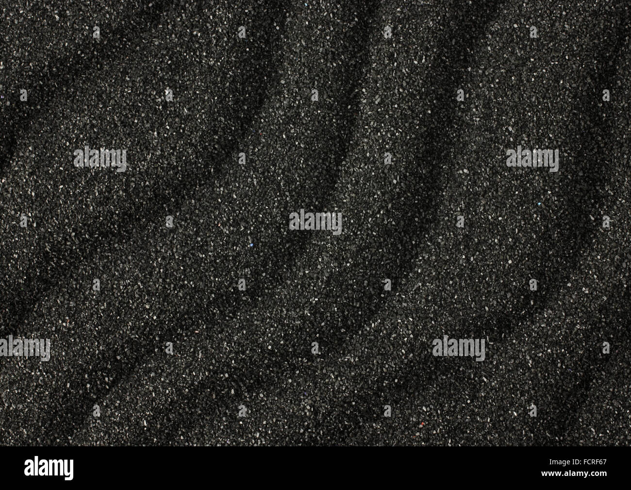 Black sand waves as background Stock Photo
