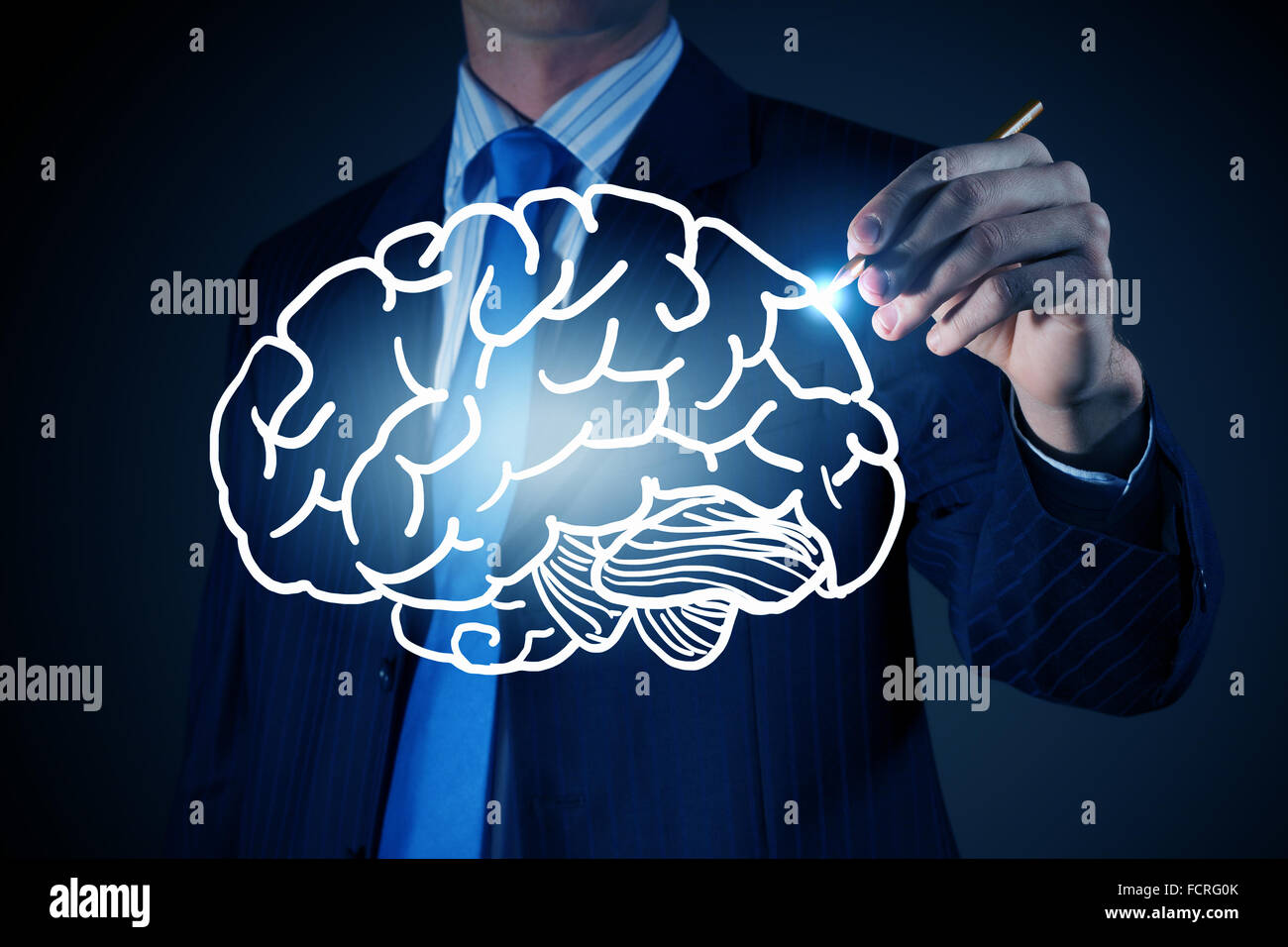 Chest view of businessman drawing human brain on screen Stock Photo