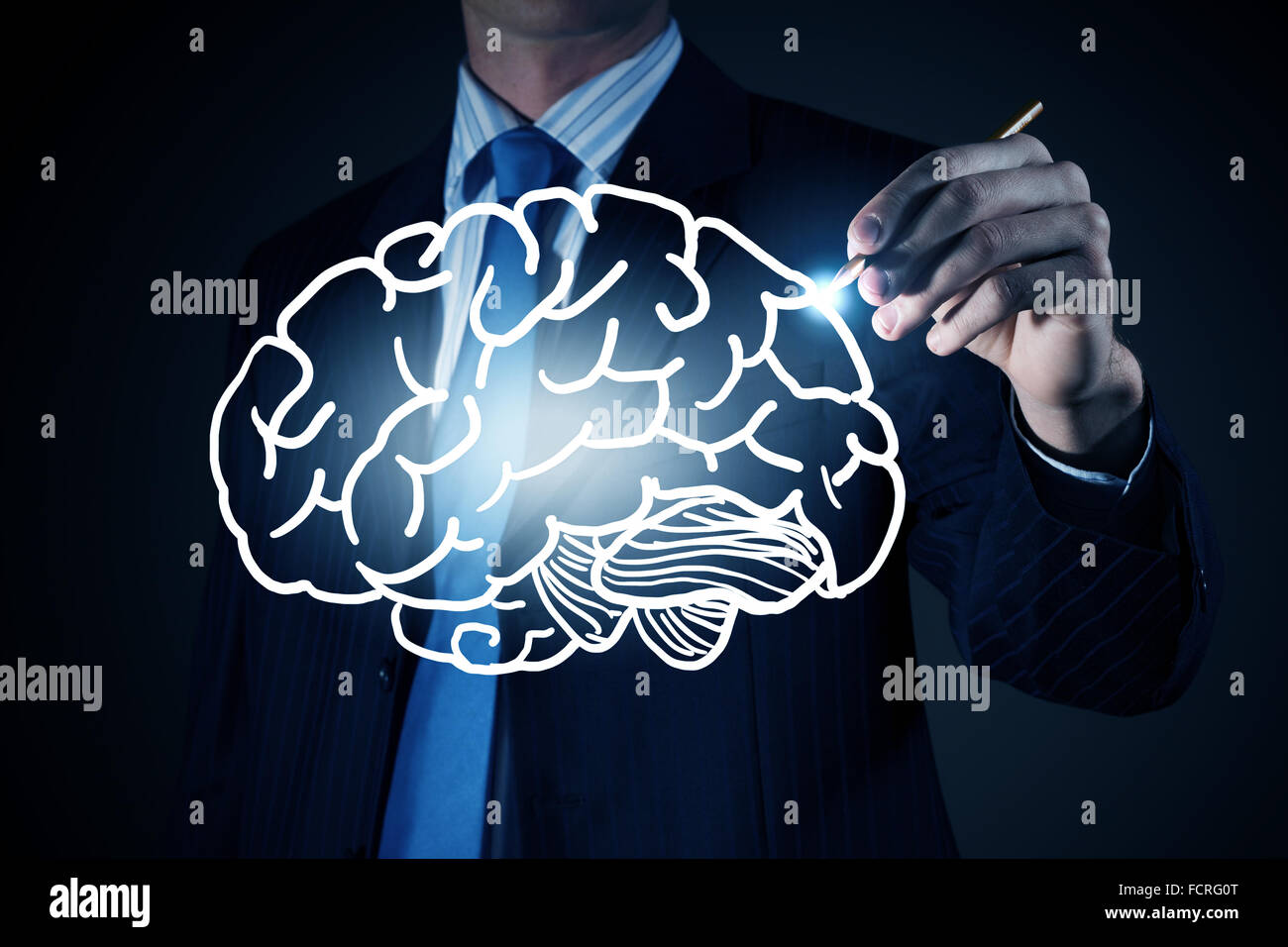 Chest view of businessman drawing human brain on screen Stock Photo