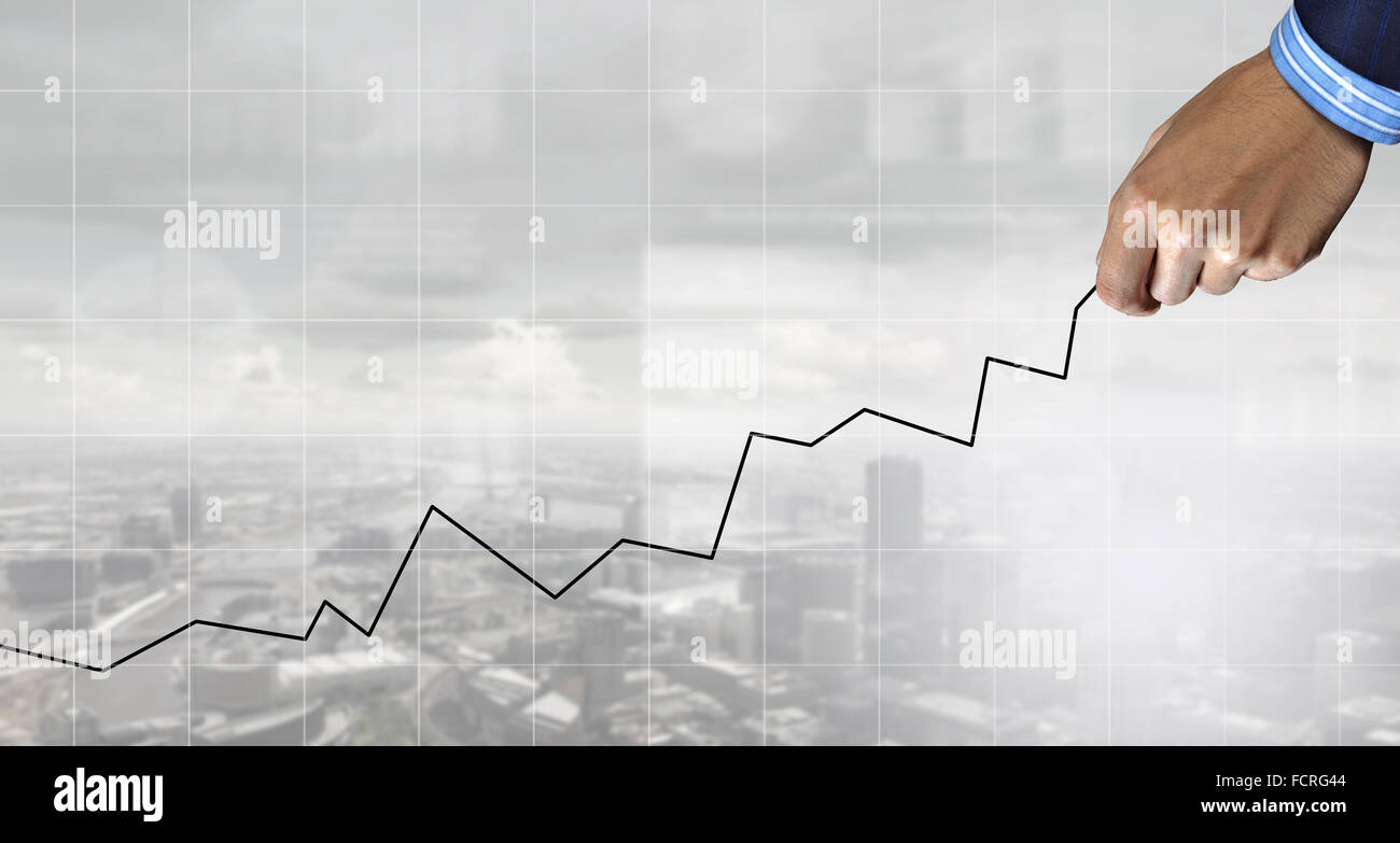 Hand of businessman drawing with pencil increasing graph Stock Photo ...