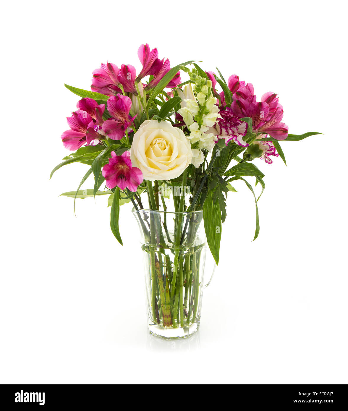 Glass Jug with bouquet of Flowers on a white background Stock Photo Alamy