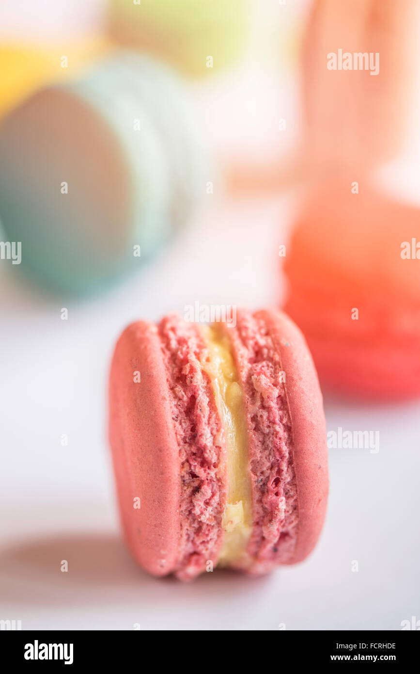 Close up to pink macaroon cookie,selective focus Stock Photo