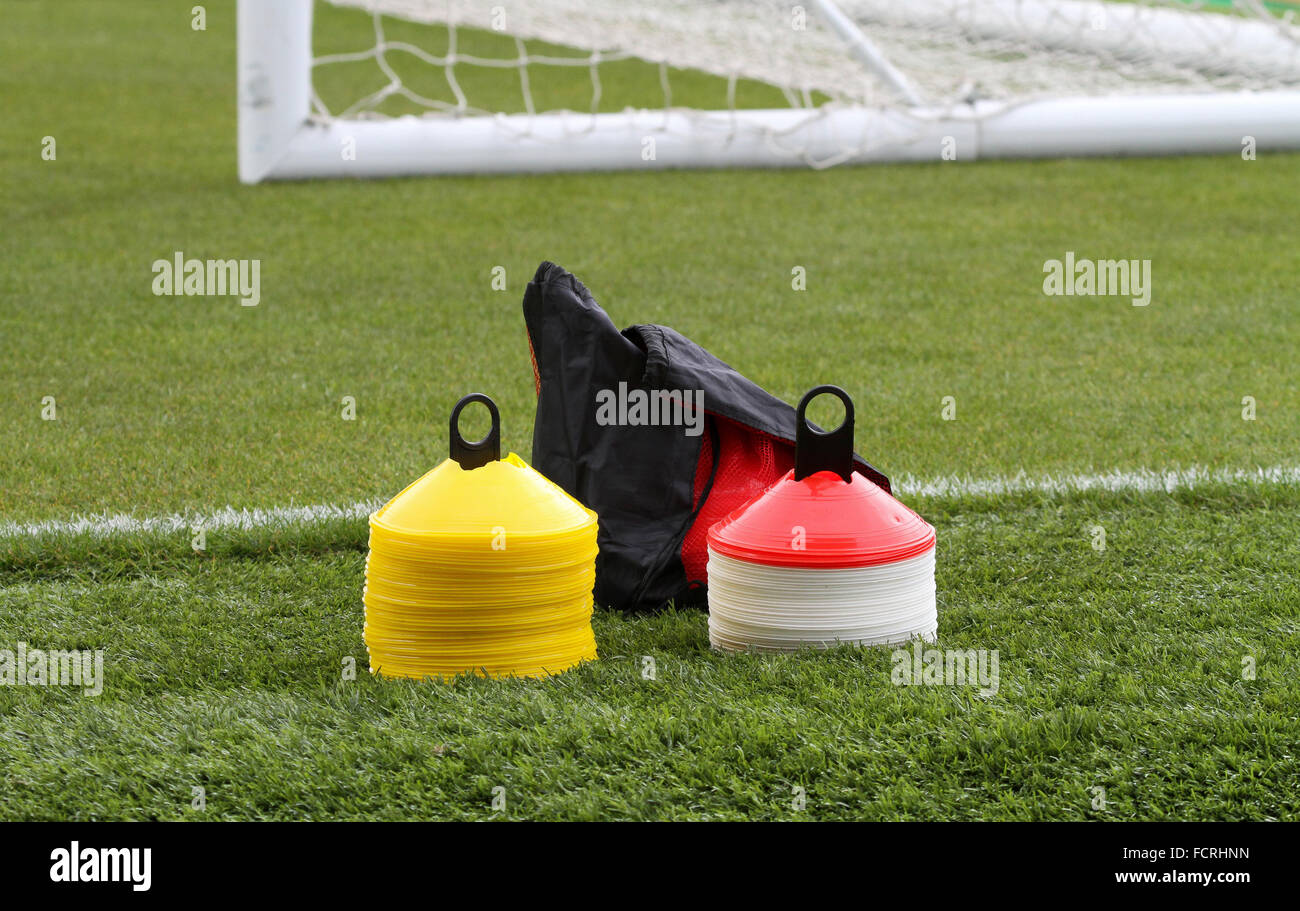 Football training cones used in training sessions and pre-match warm-ups. Stock Photo