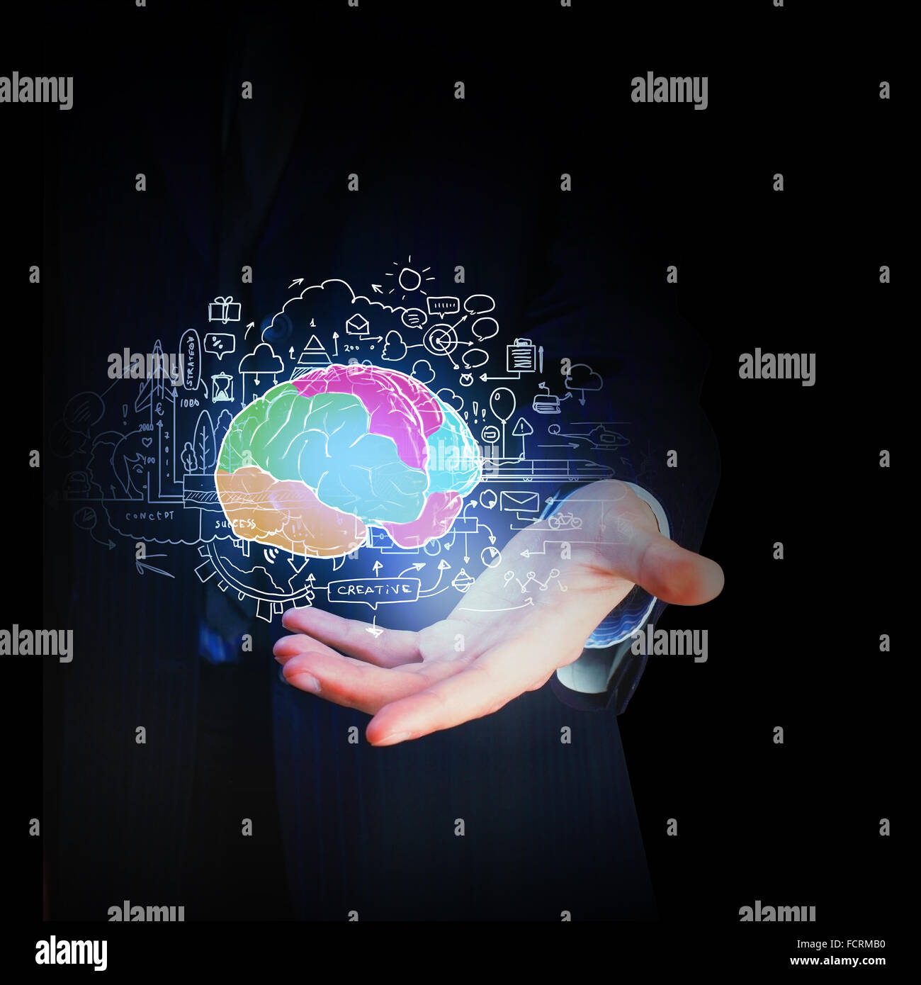 Close up of businessman hand holding brain in palm Stock Photo - Alamy